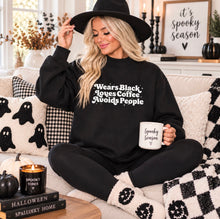 Wears black
