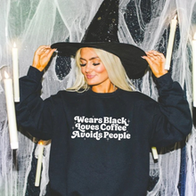 Wears black
